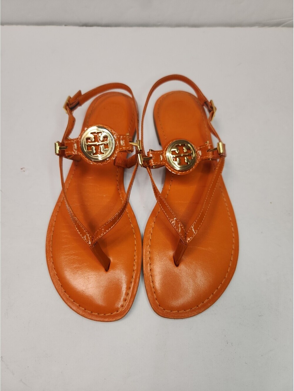 TORY BURCH Ali Sandals 6.5 Orange Patent Leather Gold Logo Thong Flat Ankle